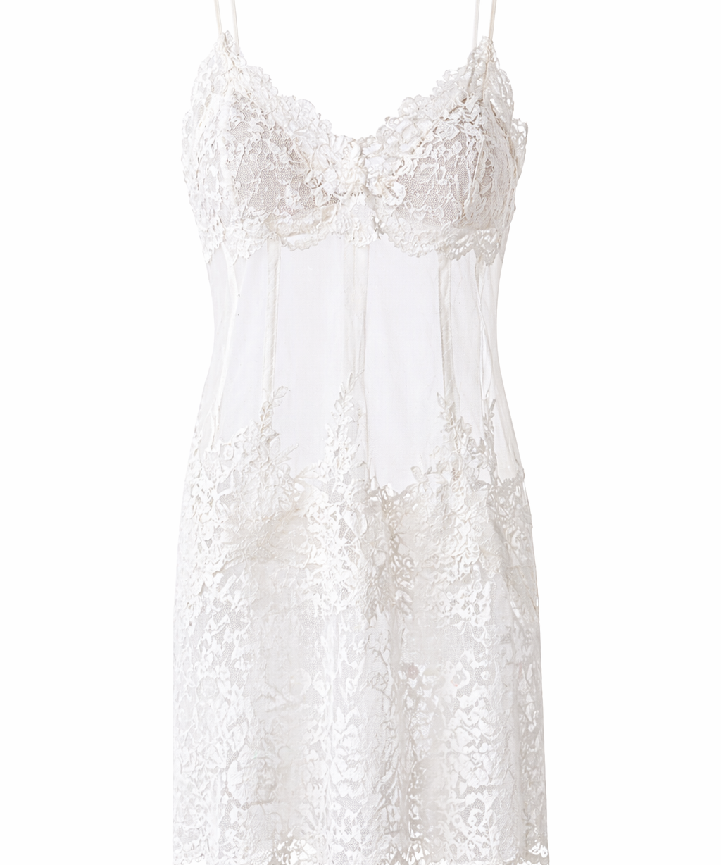 White lace slip dress on a white background