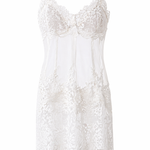 White lace slip dress on a white background