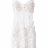 White lace slip dress on a white background