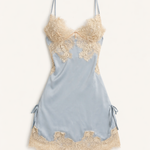 Light blue satin romantic nightgown with gold lace trim background