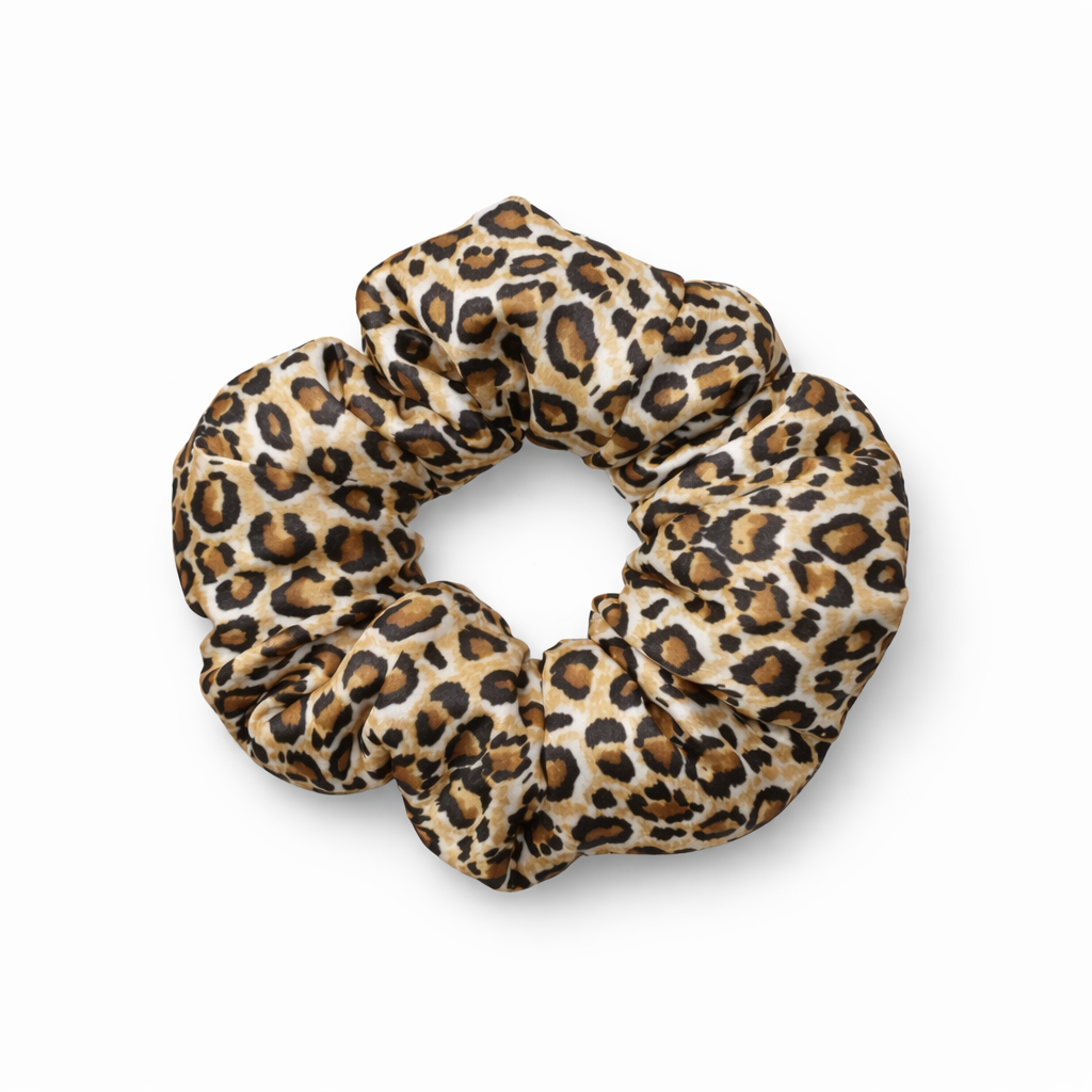 Leopard print scrunchie on a white background