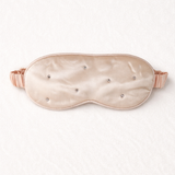 Silk sleep mask with rhinestone embellishments on a white background
