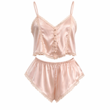 Pink satin lingerie set with lace details on a white background