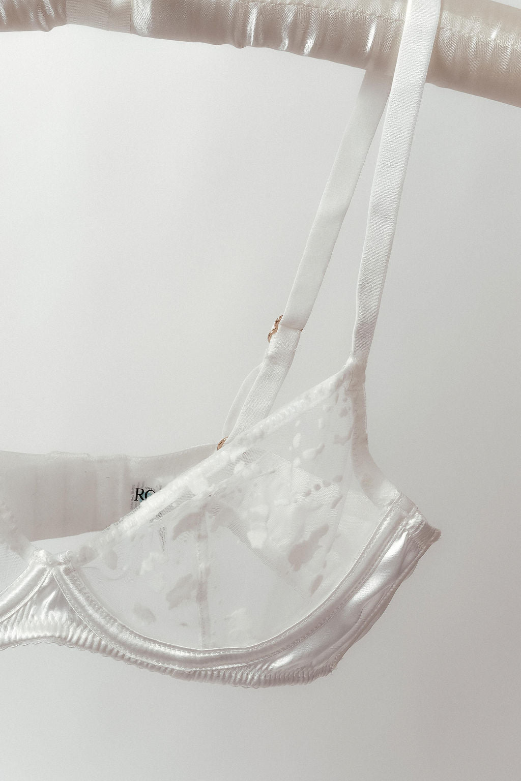 Close on whithe bra on a white background
